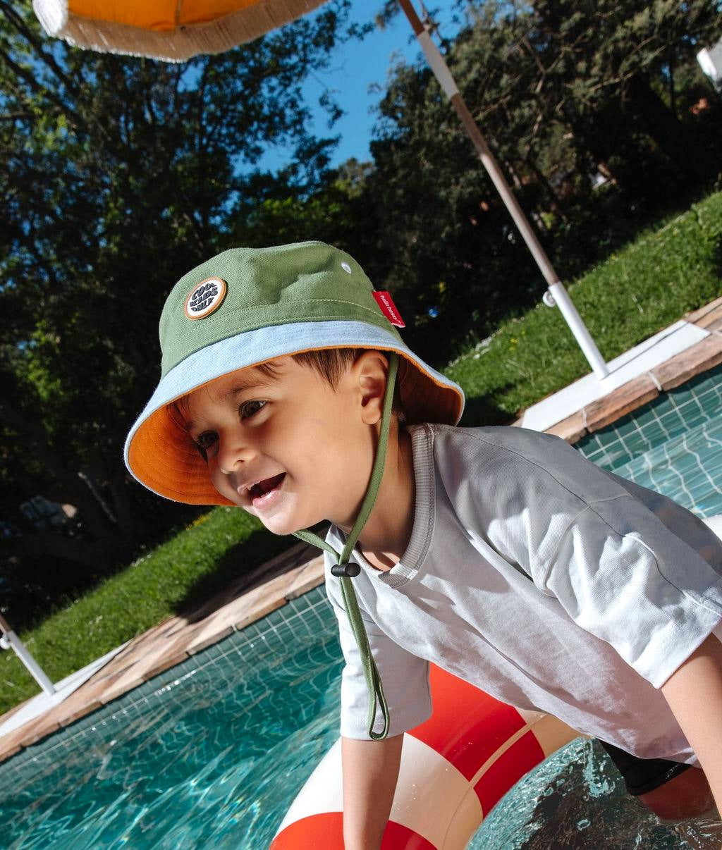 Bucket hat bambino Bicolore verde blu, interno arancione, cordino regolabile Hello Hossy