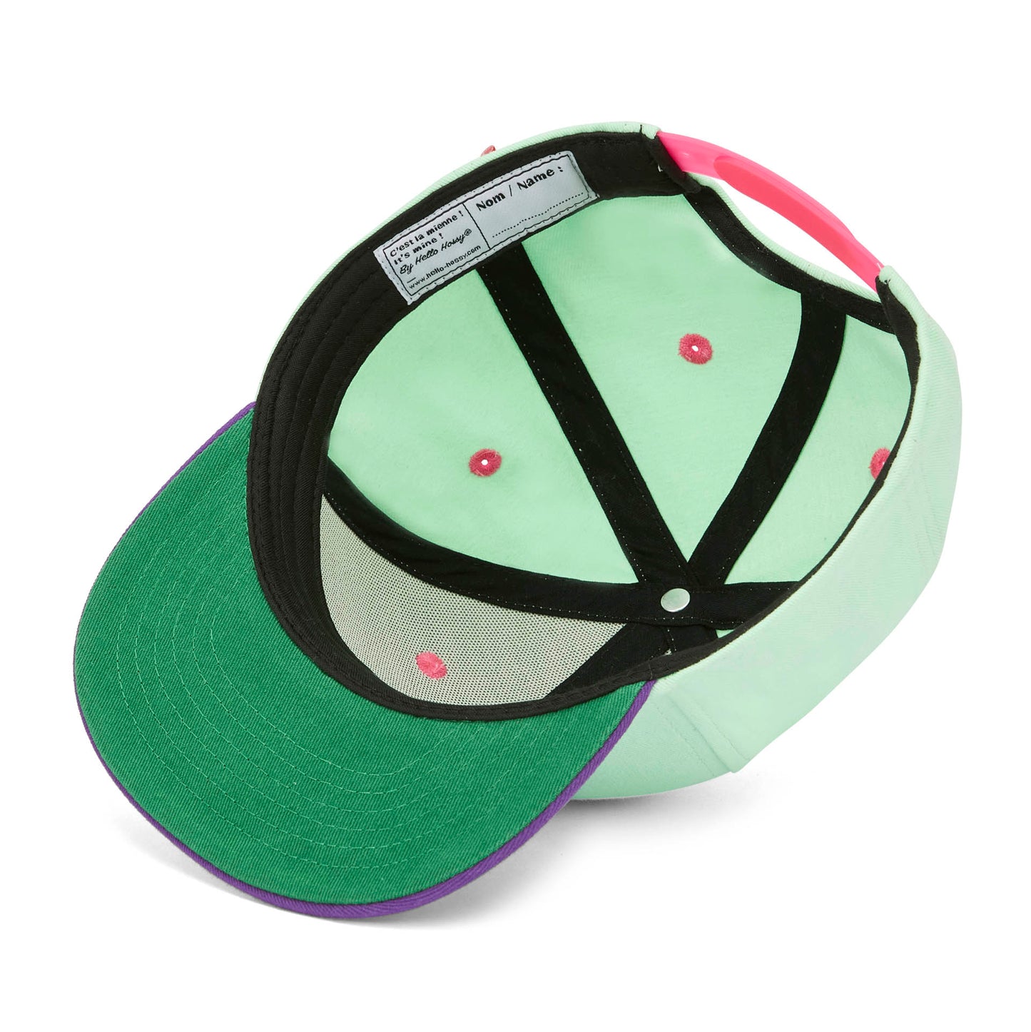 Cappellino per bambini verde menta con visiera violette, dettaglio etichetta interna Hello Hossy