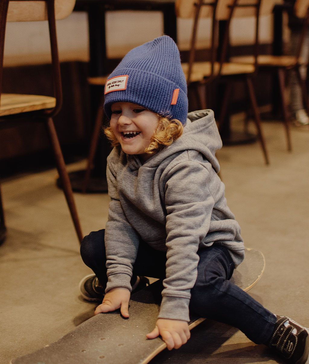 Berretto bambino blu lavorato a maglia, dettaglio arancione Hello Hossy