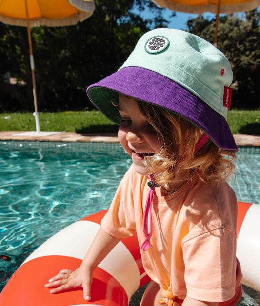 Bucket hat bambino verde e viola con cordino regolabile Hello Hossy