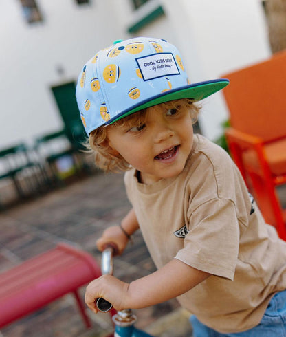 Cappellino bambino blu chiaro stampato palloni Hello Hossy