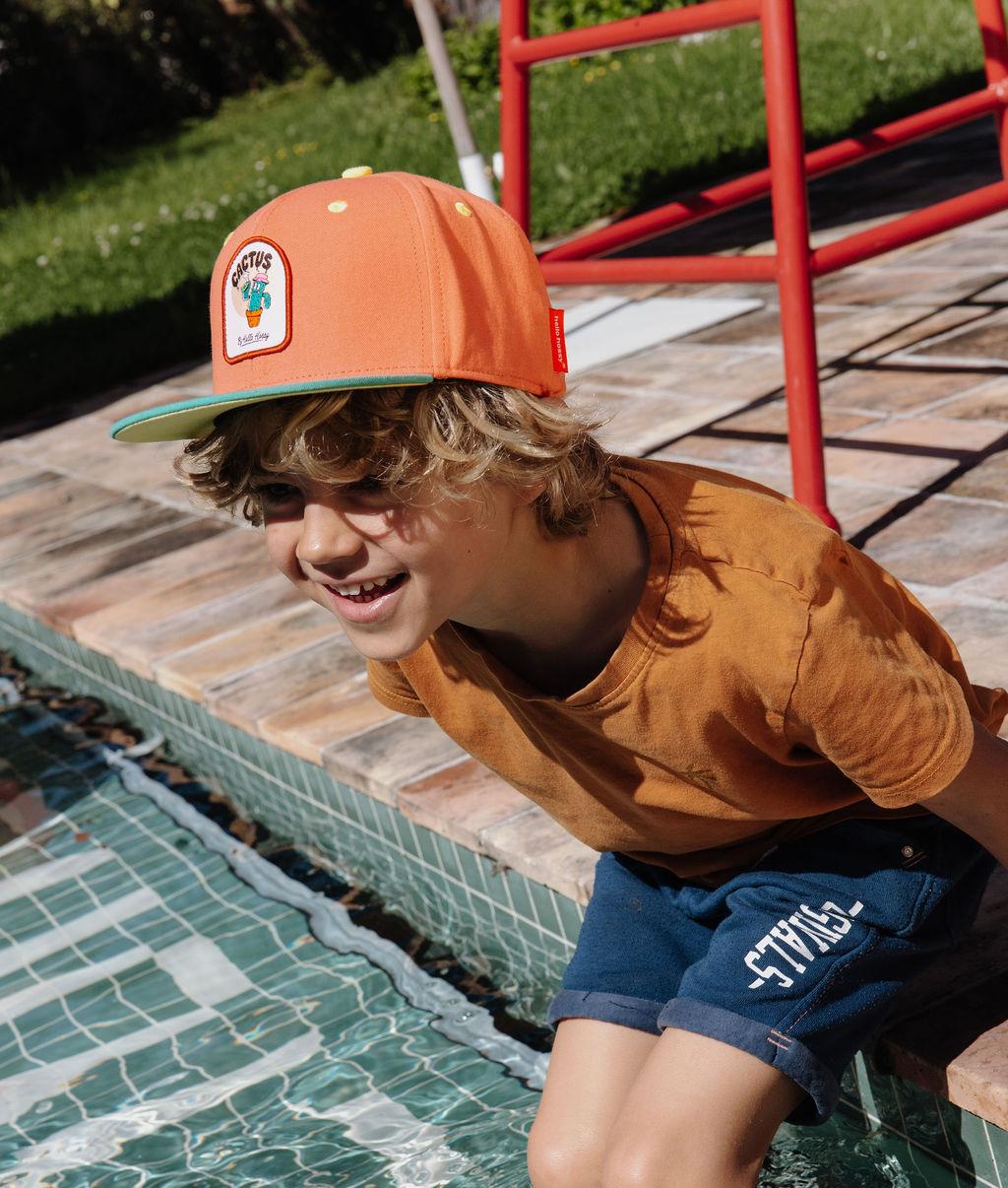 Cappellino per bambini arancione con visiera piatta, patch cactus Hello Hossy