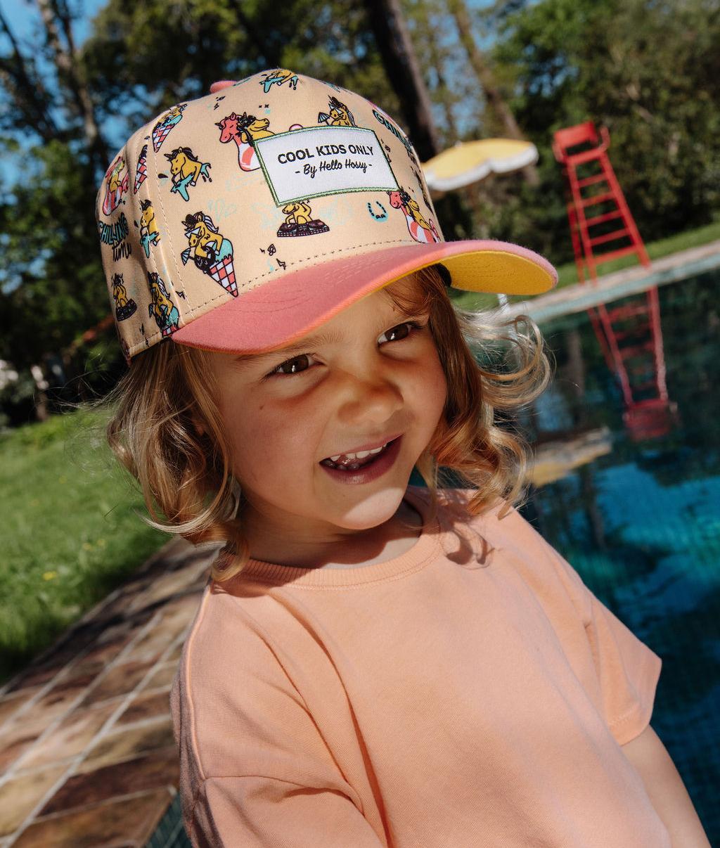 Cappellino bambino rosa giallo motivo unicorno visiera curva Hello Hossy