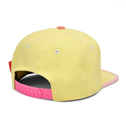Cappellino giallo per bambini con visiera piatta e bottone rosa regolabile Hello Hossy