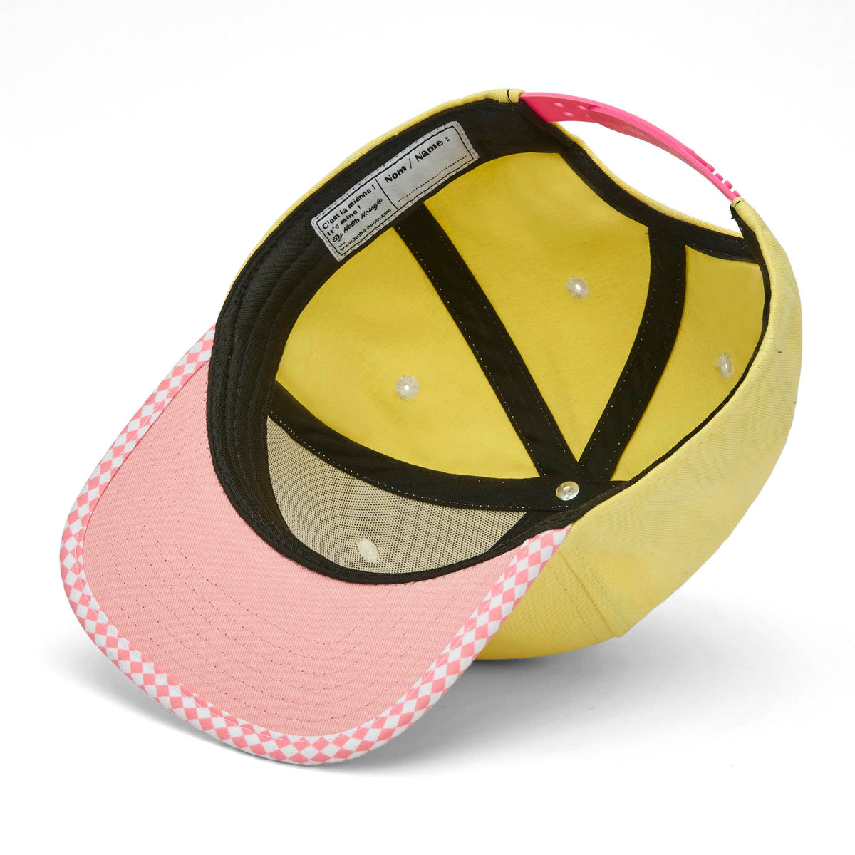 Cappellino per bambino giallo con visiera rosa piatta e bordatura a scacchi Hello Hossy