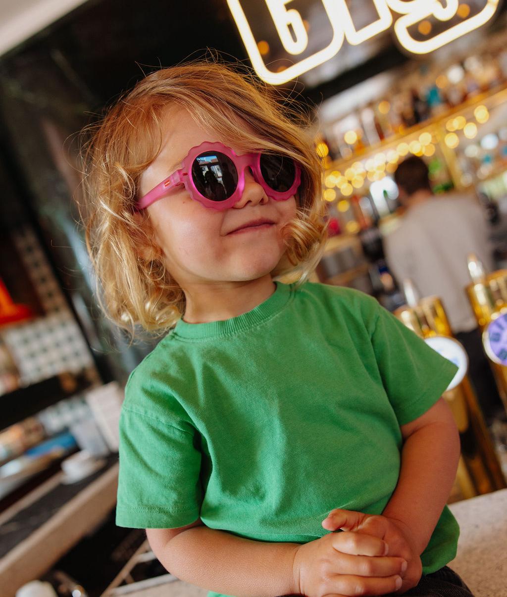 Occhiali da sole bambino fuchsia forma a fiore lenti scure Hello Hossy