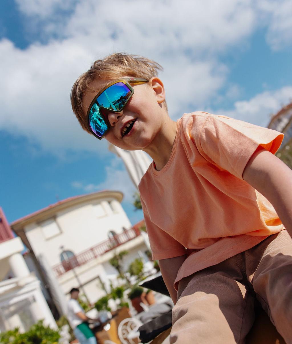 Occhiali da sole bambino verde forma sport a specchio blu montatura opaca Hello Hossy