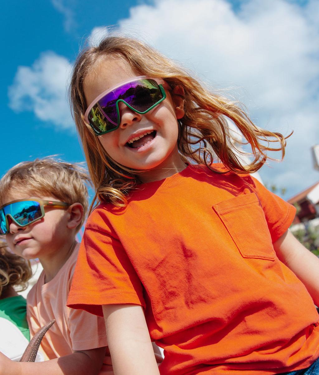Occhiali da sole per bambini con montatura rosa e lenti verdi Hello Hossy