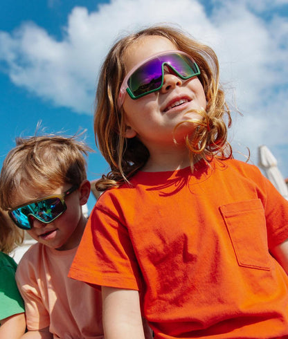 Occhiali da sole bambino rosa e verdi, lenti a specchio, forma ampia Hello Hossy