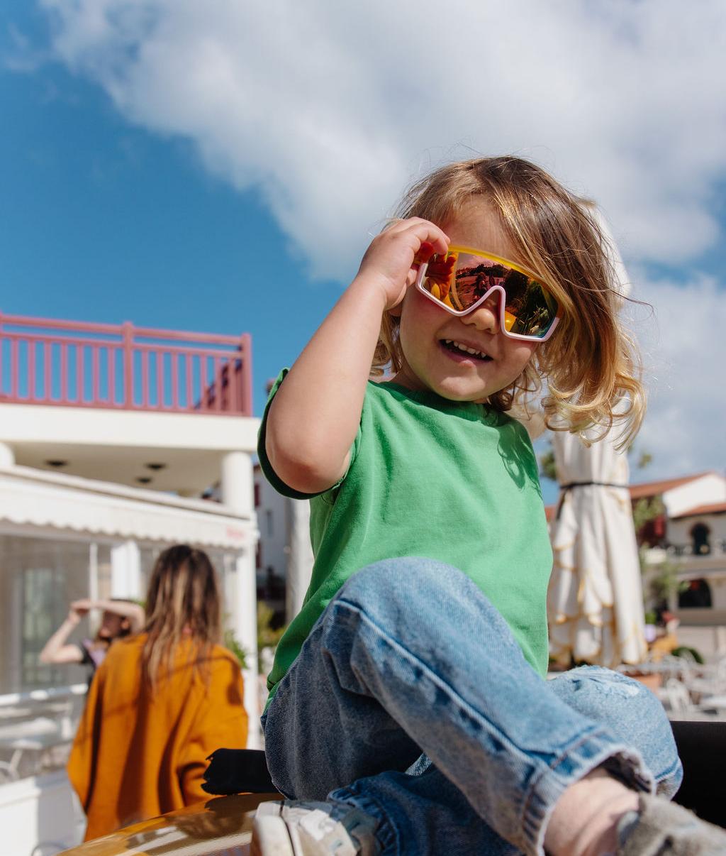 Occhiali da sole bambino arancione e rosa forma sport Hello Hossy