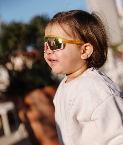 Occhiali da sole da bambino arancioni e rosa, modello a maschera, lenti a specchio Hello Hossy