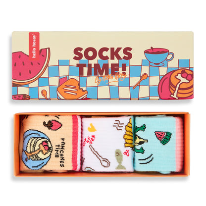 Set di 3 paia di calzini per bambini con motivi cibo nella loro confezione regalo – vista dall'alto