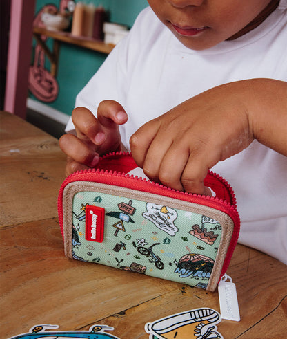 Portamonete per bambini verde con motivo viaggio e bicicletta, zip rossa Hello Hossy