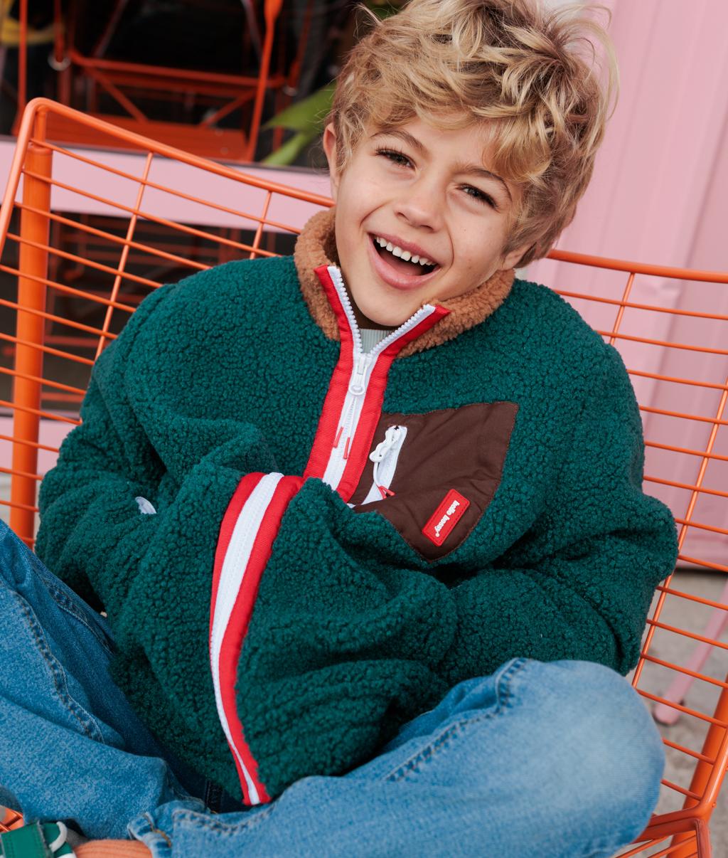 Giacca in pile bambino verde tasca marrone collo effetto montone Hello Hossy