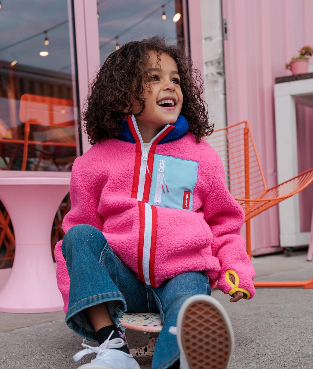 Giacca in pile bambino fuchsia, tasca blu, collo alto Hello Hossy