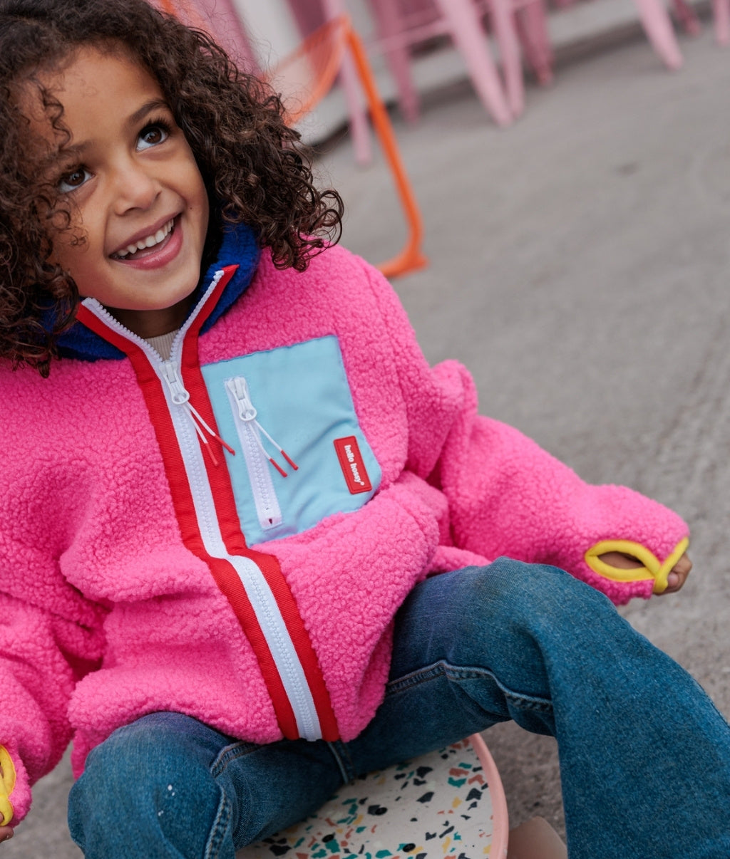 Giacca in pile bambino fuchsia tasca blu con zip dettaglio rosso Hello Hossy