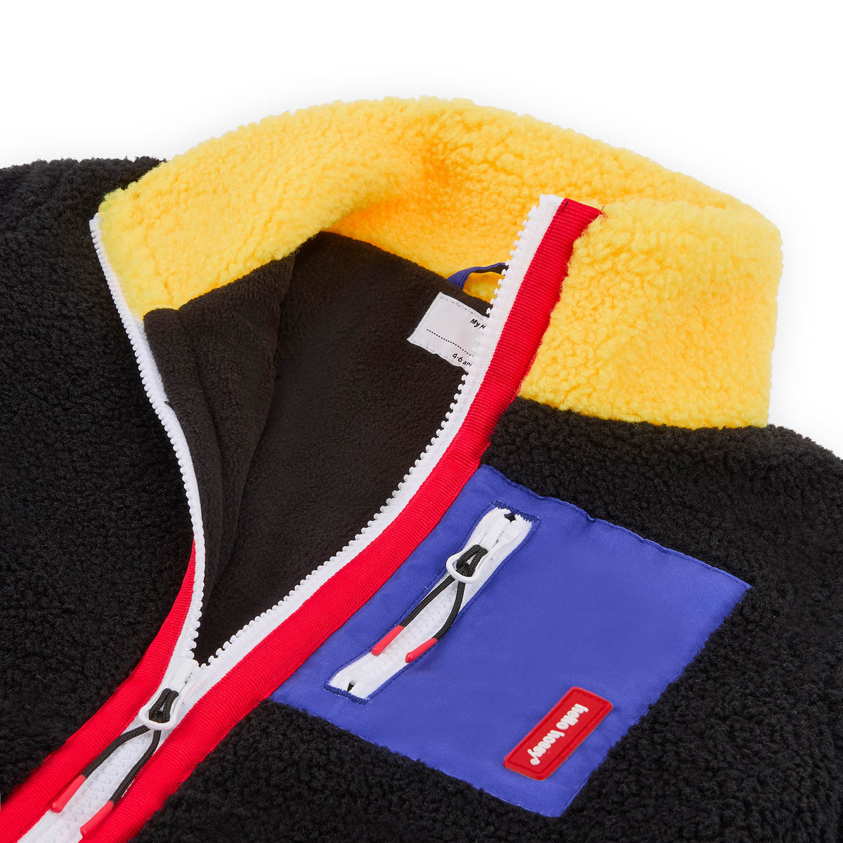 Giacca in pile bambino nero collo giallo tasca blu Hello Hossy